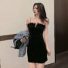 Strapless black hip-hugging short skirt